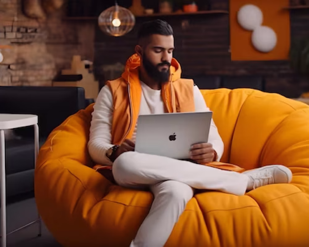 portrait-casually-dressed-positive-indian-man-sitting-orange-bean-bag-pouffe-smiling-generative-ai_924589-1474 Portrait casually dressed positive indian man sitting orange bean bag pouffe smiling generative ai 1474 – CAFA Formations